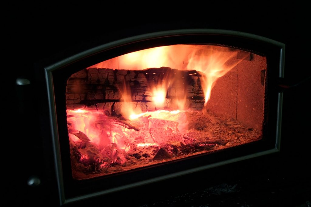 Logs burning in a wood stove